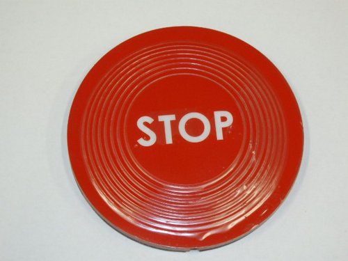 Magnetic stop button