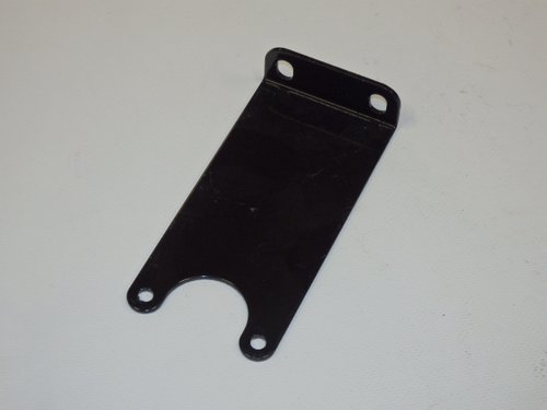 Strut plate with brush cover